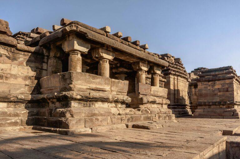 Explore the historic stone temple architecture of Aihole, Karnataka, India.